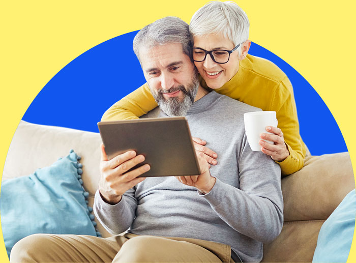 Couple looking at a tablet
